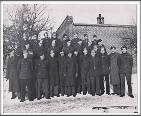 Please help us identify these IOWA Kriegies.
Front row 3rd from left is Charles L. Jones, 4th from right behind shorter Kriegy in the front row, is Robert Oshlo.  Top row, 3rd from right is Robert Aschim.
